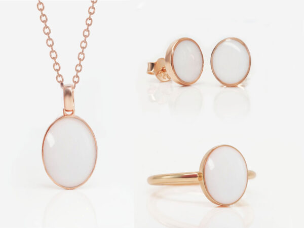white background necklace ring and studded earrings from keepsakemom oval shape