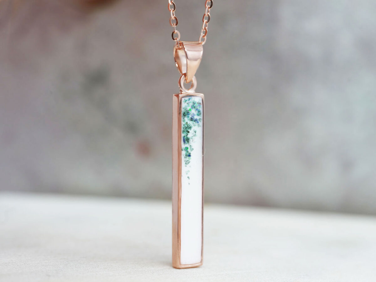breastmilk jewelry long bar stick filled with milk in rectangular shape vertical from Keepsakemom in silver rose gold with emerald gems