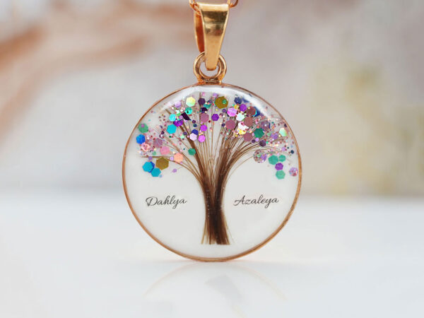 breastmilk jewelry disc necklace tree of life with baby's lock of hair and birth month color multicolored rainbow unicorn flakes tree from KeepsakeMom