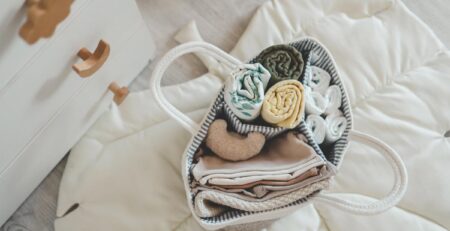 Packed diaper bag on bed