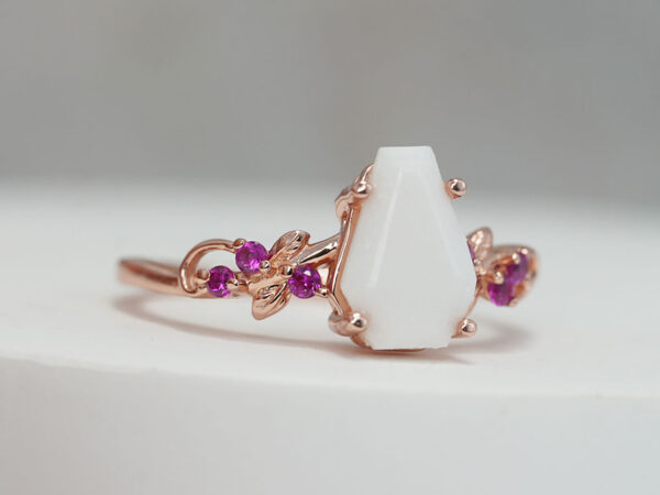 breastmilk ring faceted diamond long shape with ruby crystals in rose gold from keepsakemom
