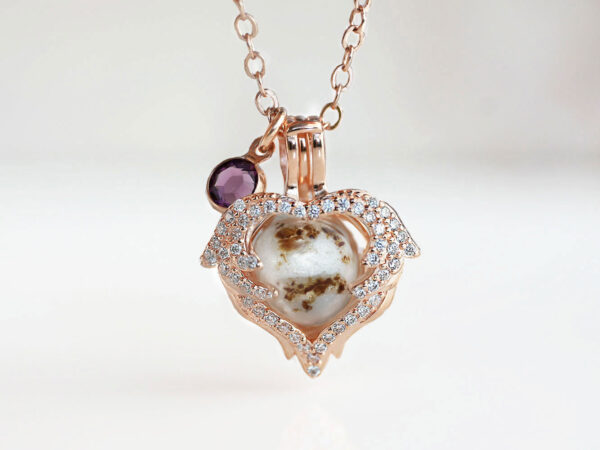breastmilk jewelry necklace with placenta, umbilical cord and ashes in rose gold plating heart shaped locket from keepsakemom