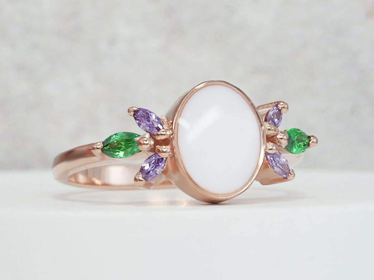 breastmilk jewelry oval ring with crystals shaped as leaves green purple gems oval stone rose gold from keepsakemom DIY kit