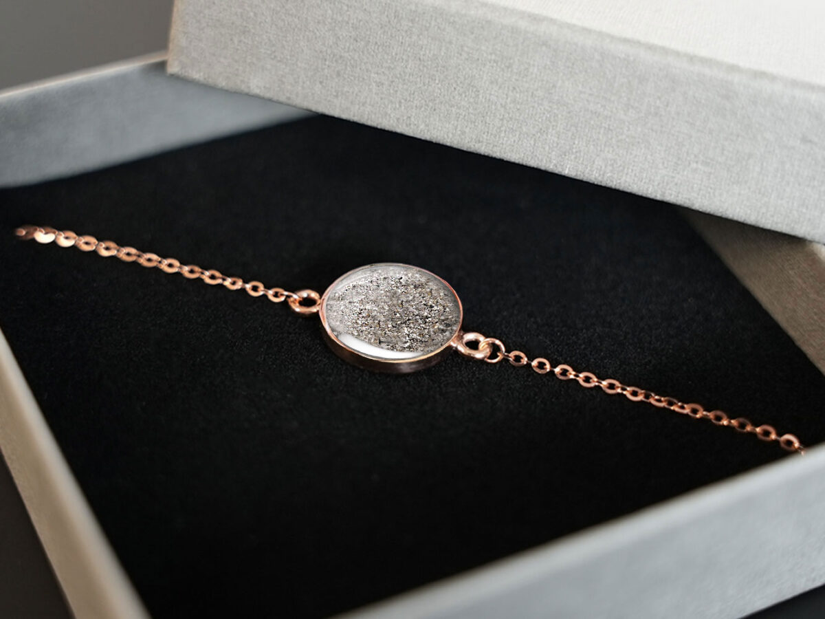 Breastmilk Bracelet Large Disc Keepsakemom horse memorial bracelet filled with animal's ashes for a pet owner, a rose gold disc bracelet with rose gold chain from keepsakemom