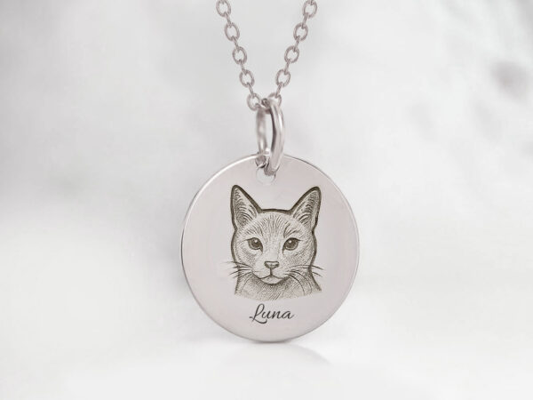 memorial jewelry, a necklace with a silver disc with engraving of a cat for a pet owner, a small round sterling silver disc with silver chain from keepsakemom