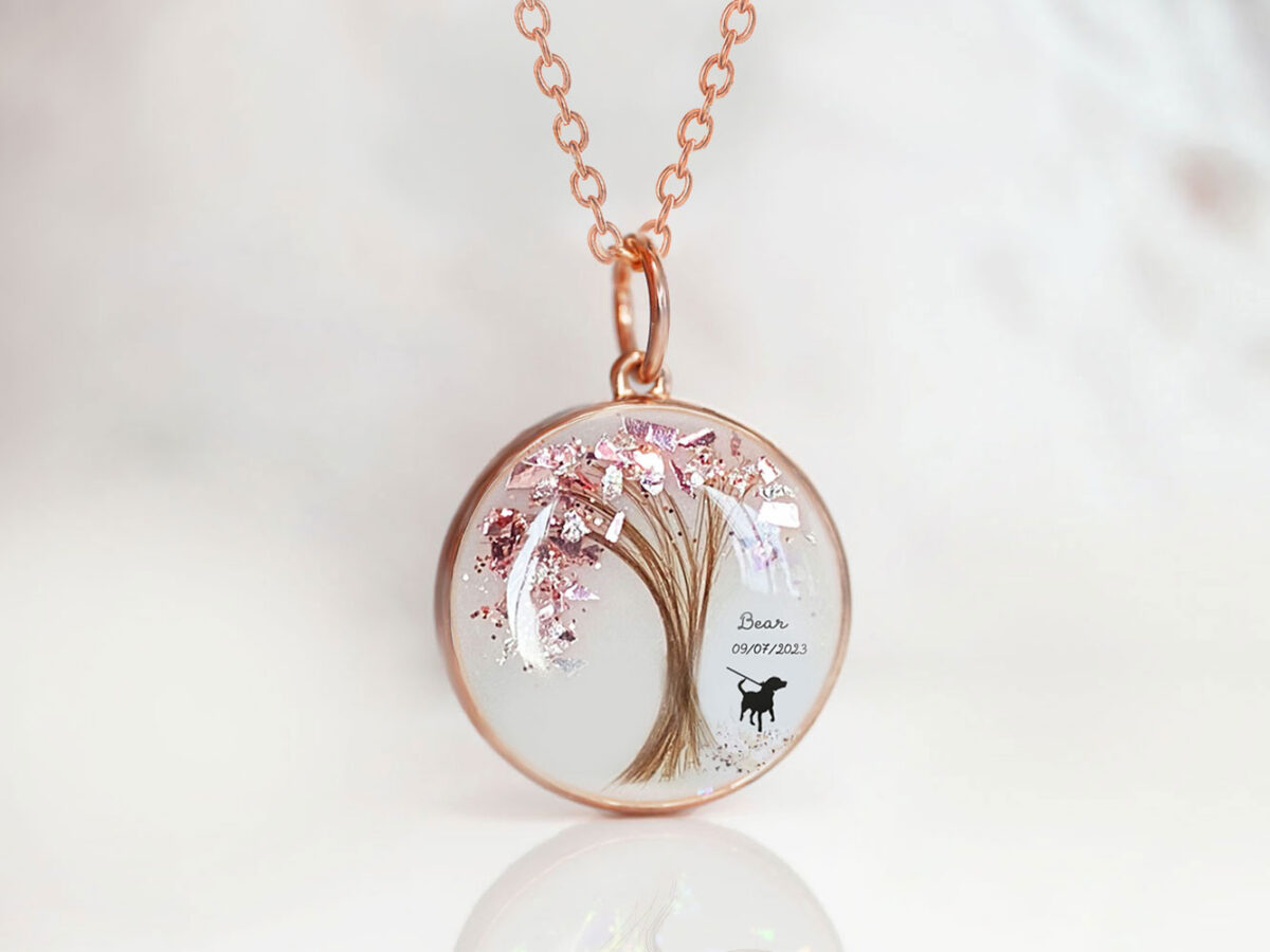 Breastmilk Jewelry Disc Necklace Dog Fur Hair Outline Opal Flakes Keepsakemom Memorial jewelry from keepsakemom, a rose gold pendant with a tree shaped from dog's fur and rose flakes on top, an image of a dog printed on the right side of the tree,