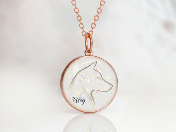 memorial disc necklace for a pet owner with a dog's outline from animal fur with opal flakes and the dog's name, rose gold disc from keepsakemom