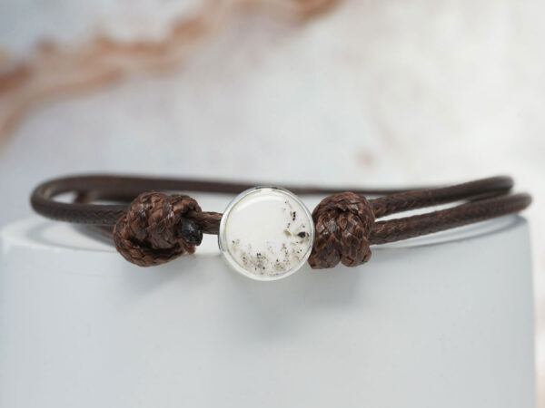 cremation jewelry bracelet for dads with sterling silver disc filled with breastmilk and ashes on brown waxed cord thick from keepsakemom