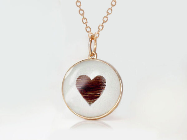 memorial disc pendant with a heart made from the horse's hair for a pet owner, a rose gold disc from keepsakemom