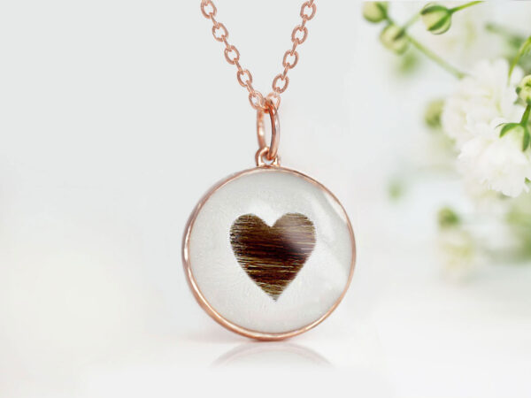 memorial disc pendant with a heart formed from dog's fur, a round rose gold pendant for a pet owner from keepsakemom