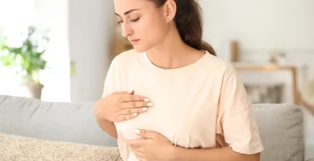 A young mom with breast pain